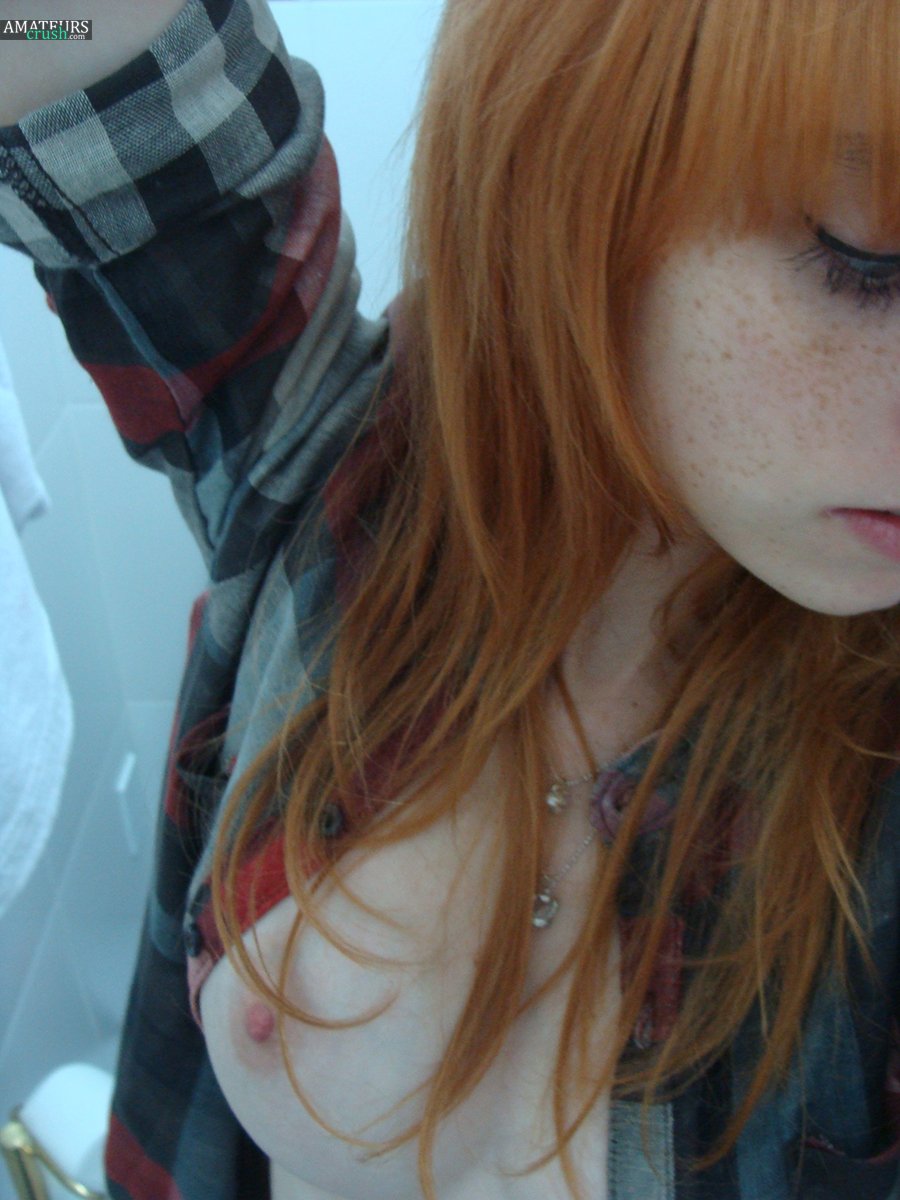 redhead-freckled-naked-teen-selfie-tits